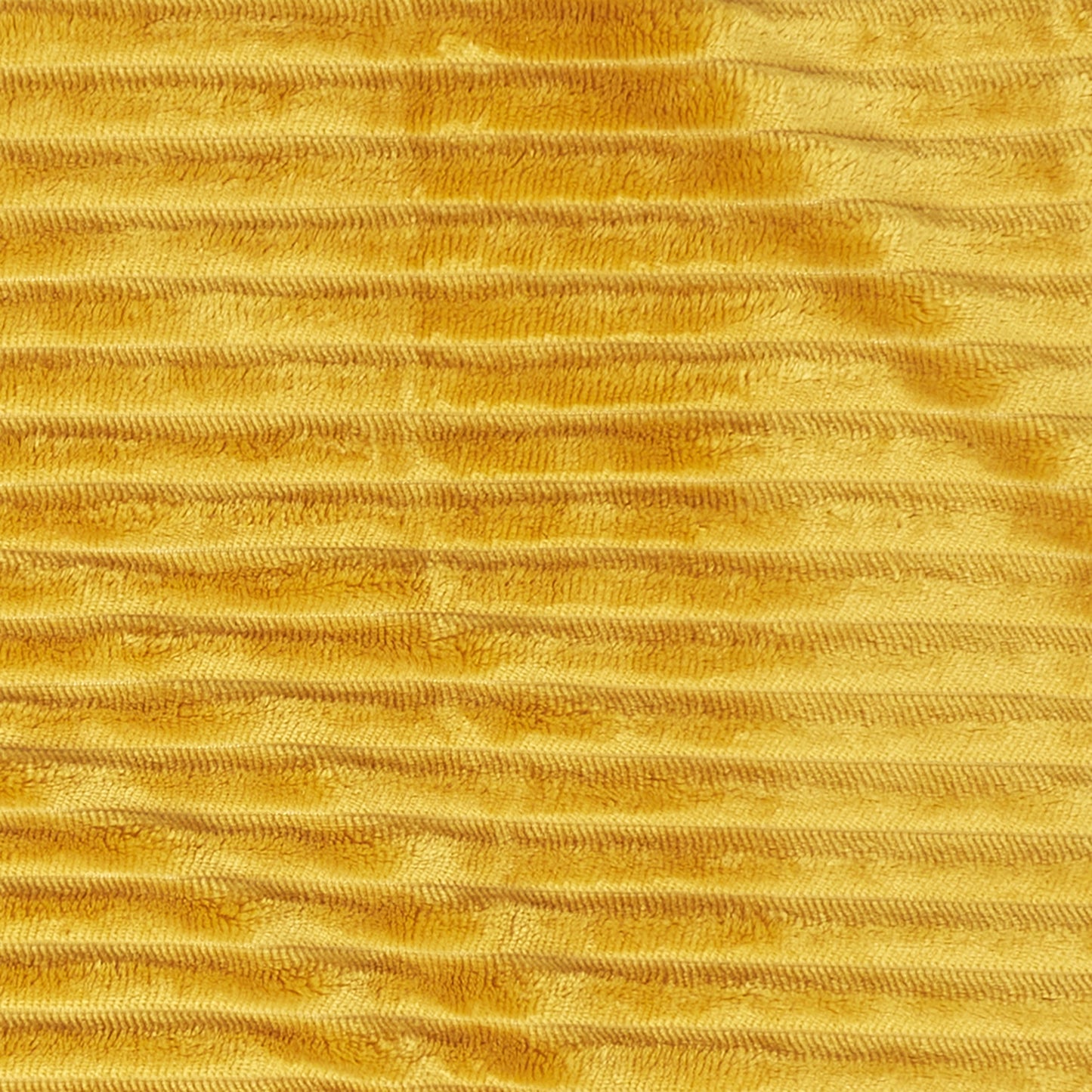 Détail de la flanelle côtelée et du Sherpa moutarde du plaid ZenPur, texture moelleuse et chaleureuse