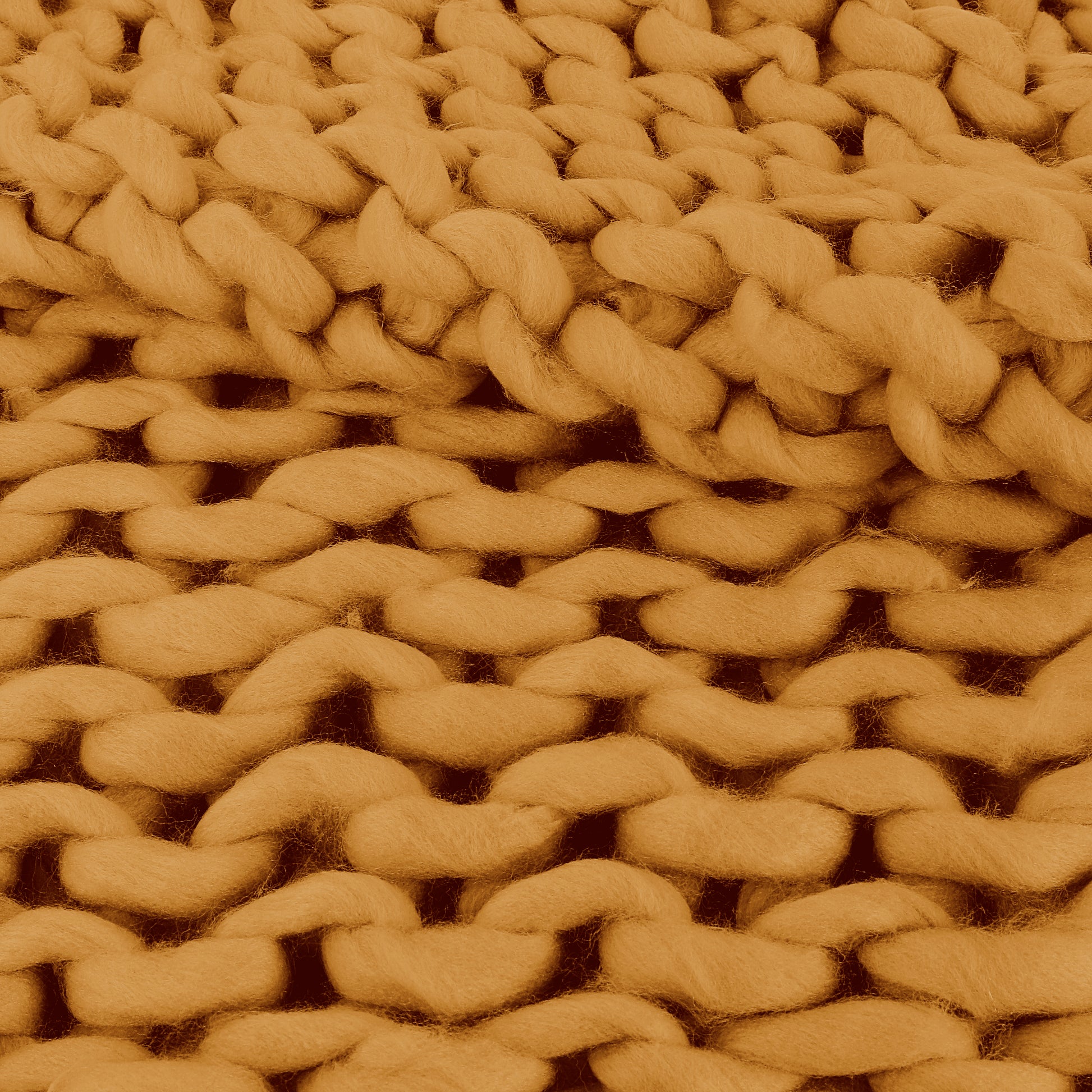 Détail du plaid grosse maille chunky ZenPur, laine épaisse jaune pour chaleur et design moderne