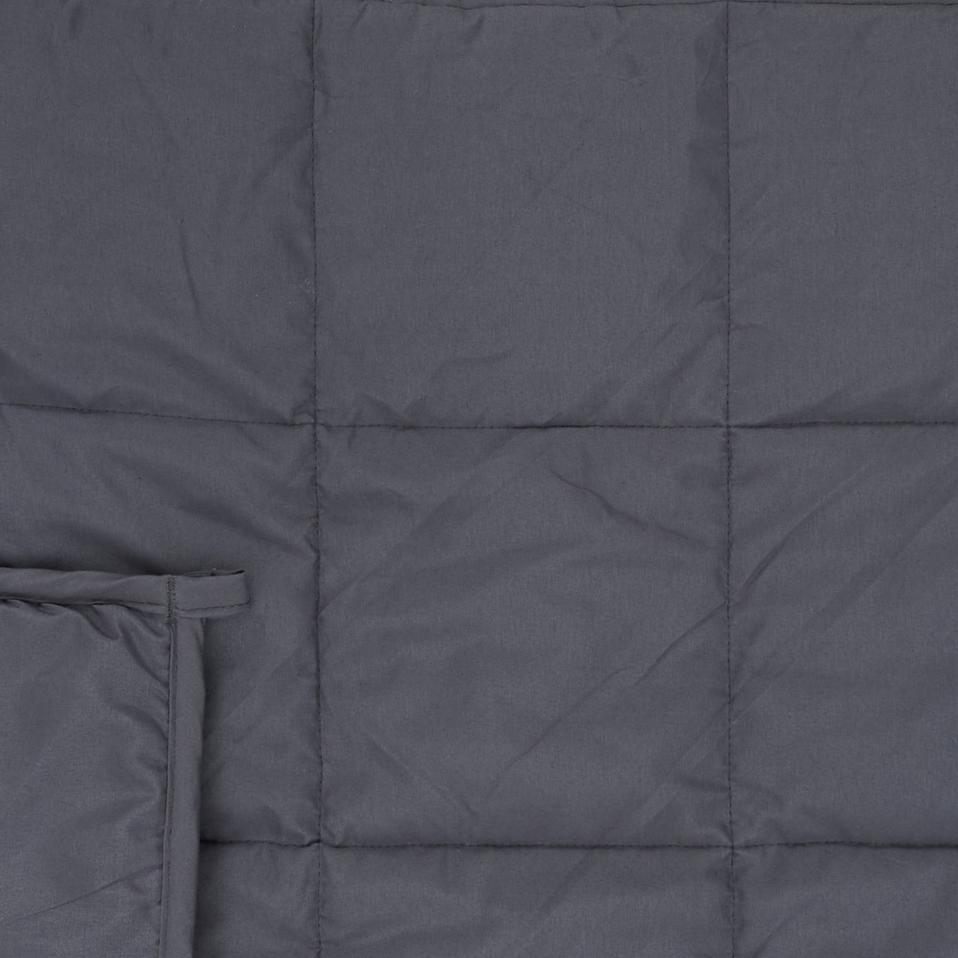 Détail du tissu doux et respirant de la couverture pondérée ZenPur 7kg, confort optimal