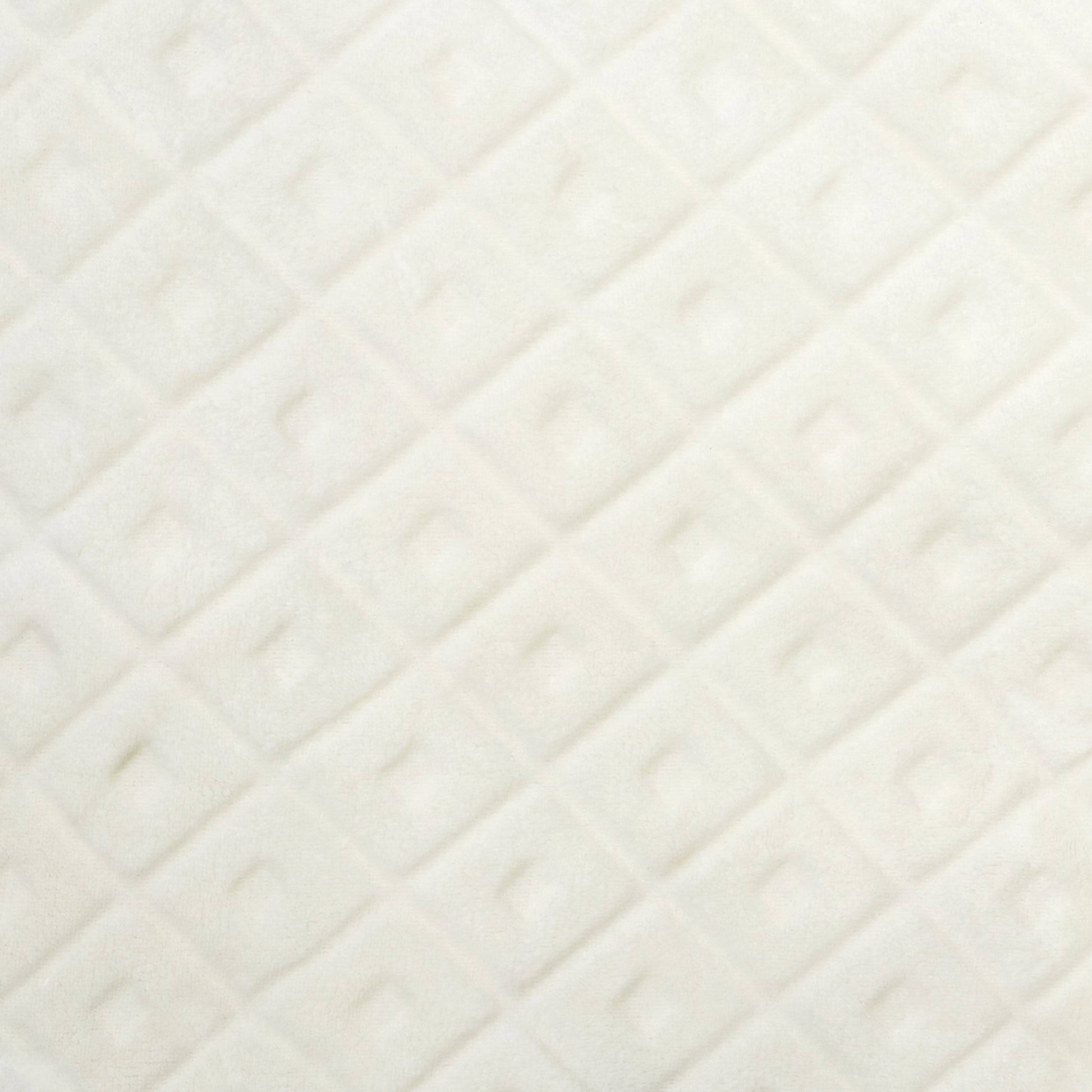 Détail du tissu embossé beige du plaid ZenPur, texture douce et motif raffiné