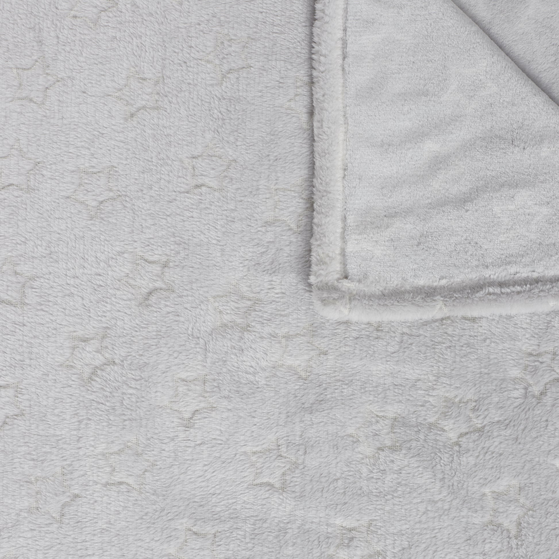 Plaid ZenPur phosphorescent avec étoiles, idéal pour soirées cocooning et ambiance relaxante